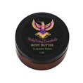 Load image into Gallery viewer, Body butter container with a colorful hummingbird design on the label against a black background
